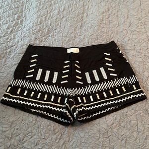 Chloe Oliver black shorts with threaded art.